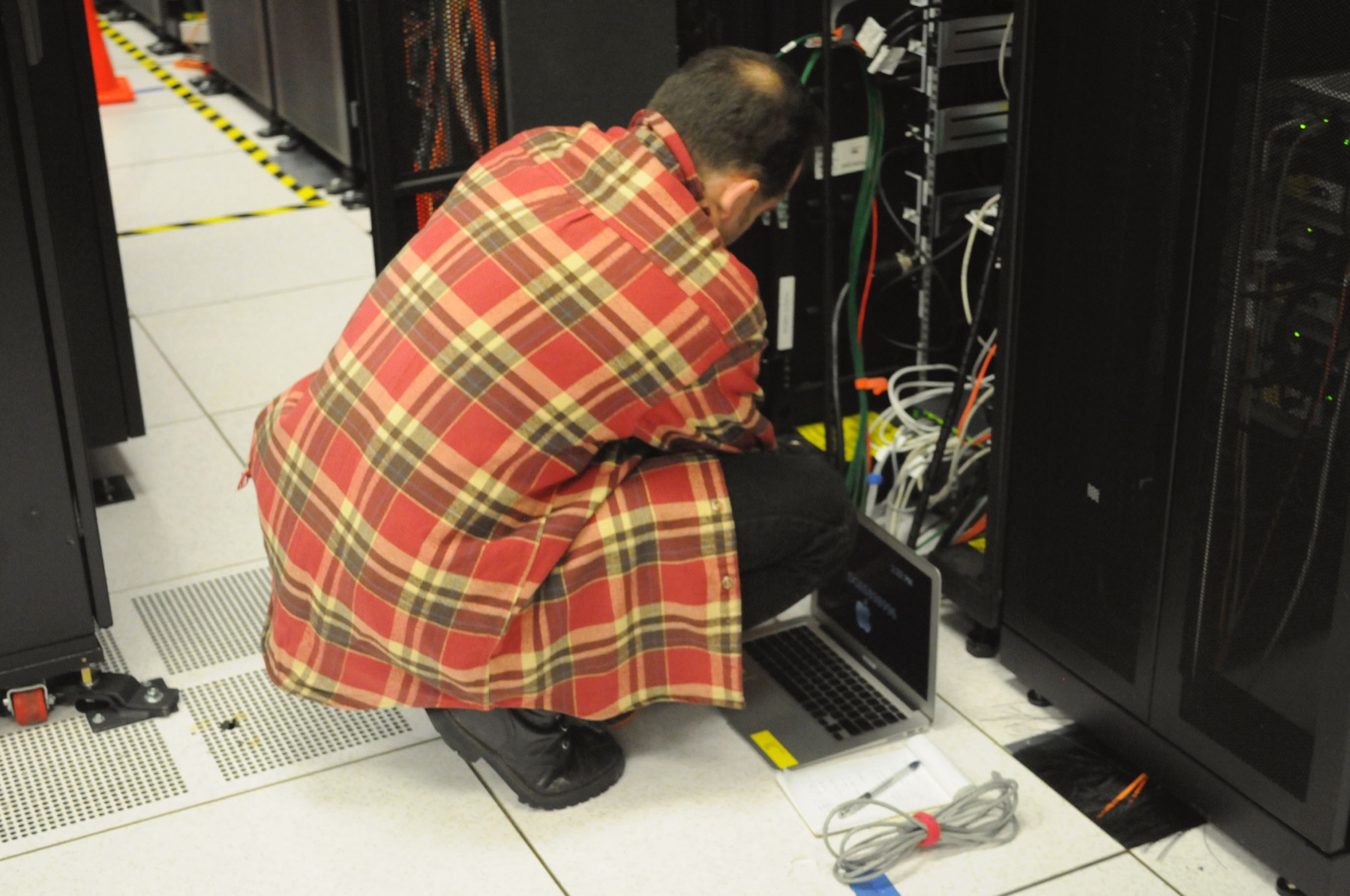 Sandboxing, credential isolation, network monitoring, and human review now belong inside frontier-model evaluation environments. Image: Wikimedia Commons / Derrick Coetzee, CC0.