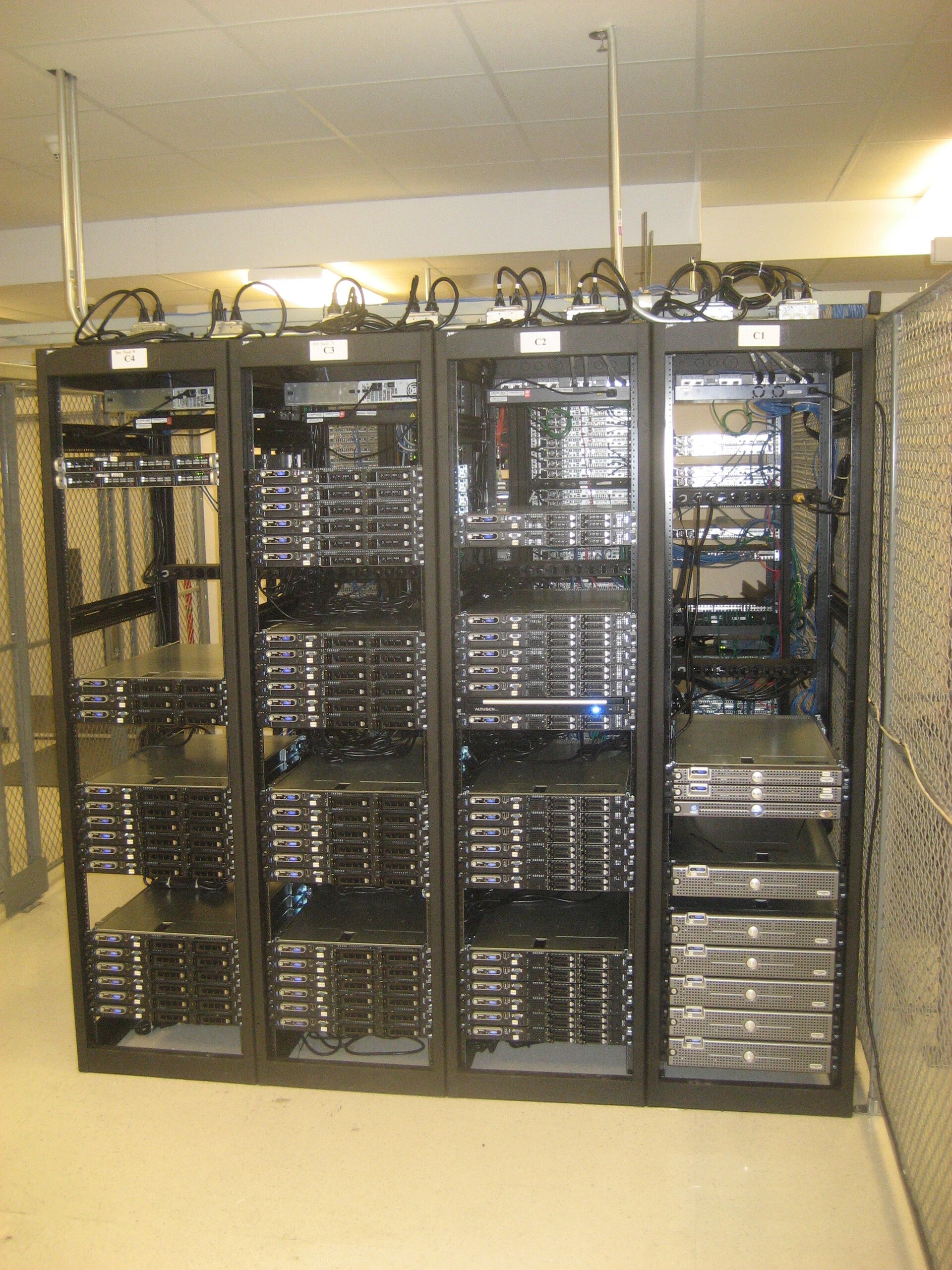 Multi-gigawatt AI deals convert model competition into rack, networking, and power commitments. Image: Wikimedia Commons / meta:User:Midom, CC BY 2.0.