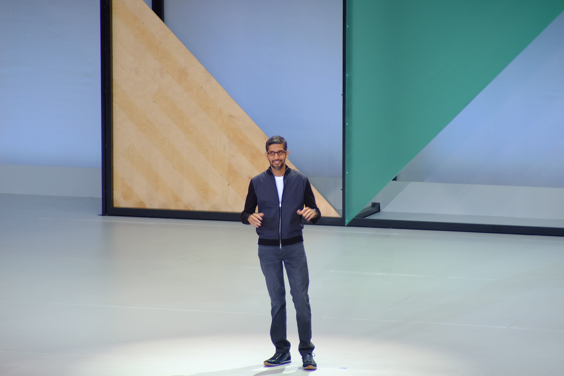 Sundar Pichai has framed AI as a company-wide operating shift, but investors are now testing the economics behind that shift. Image: Wikimedia Commons / Steven Zimmerman, CC BY-SA 4.0.