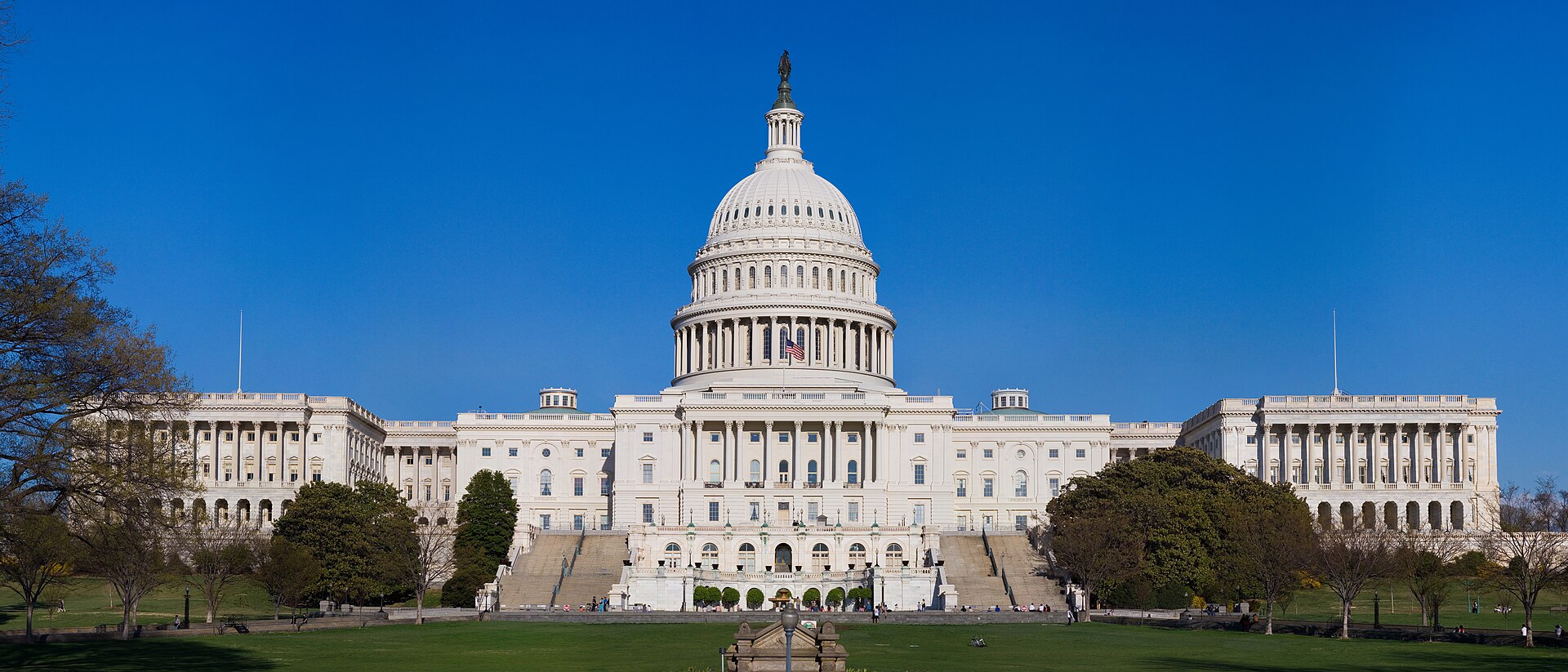 The bill moves frontier-model control from voluntary company policy toward federal emergency authority. Image: Wikimedia Commons / Noclip, public domain.