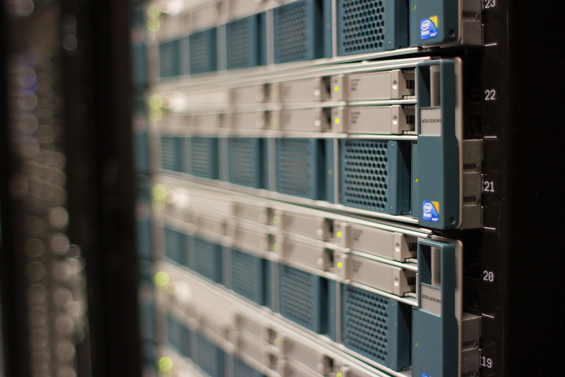 Consumer voice AI turns every prompt, retry, and context window into data center demand. Image: Wikimedia Commons / Victorgrigas, CC BY-SA 3.0.