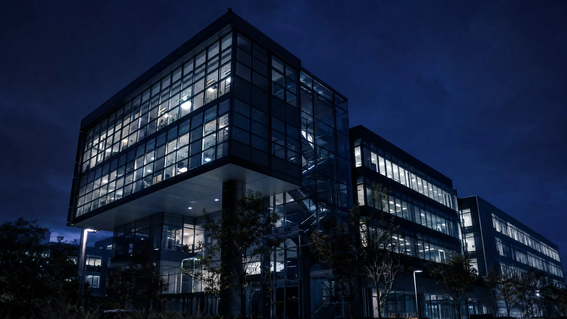 The corporate architecture of the AI era — the headquarters buildings of the companies now racing to build the first AGI system.